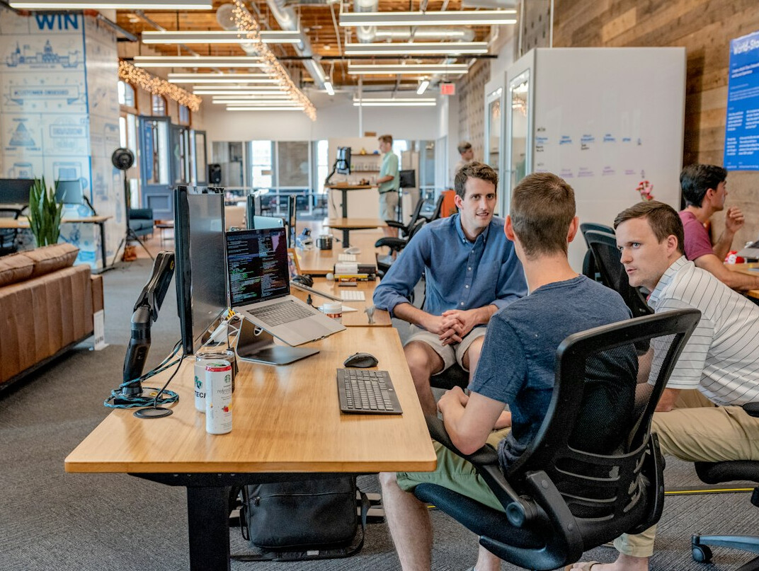 business team discussing software