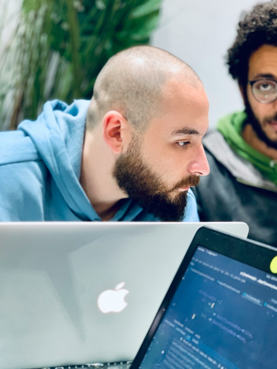 software developers coding together