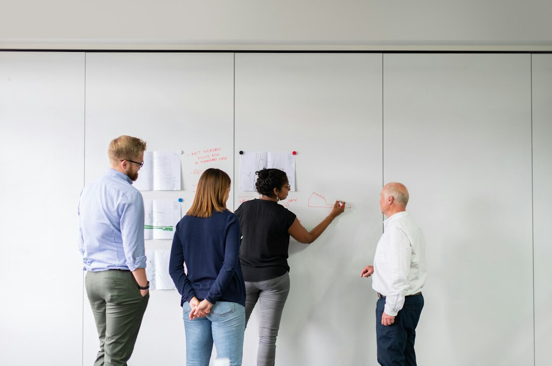 business team meeting with computers