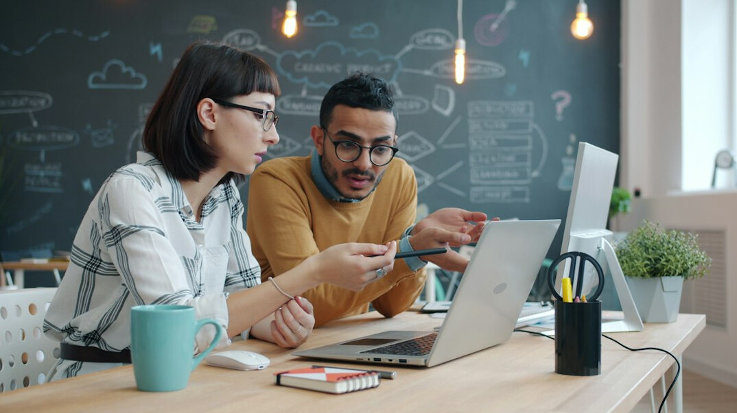 business team meeting with computers